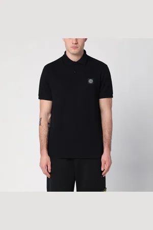 Stone Island Polo nera in cotone con patch logo