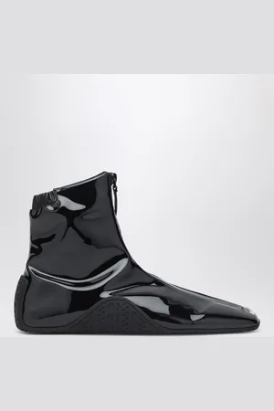 Alaïa Sneaker nera in tessuto stretch verniciato