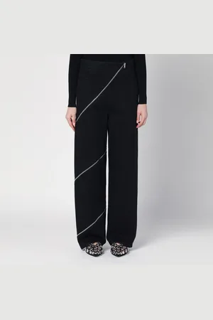 Alaïa Jeans spirale con zip nero