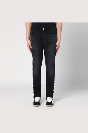 AMIRI Jeans skinny nero vintage con ricamo logo
