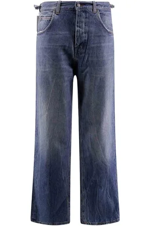 haikure Jeans in cotone con patch logo posteriore