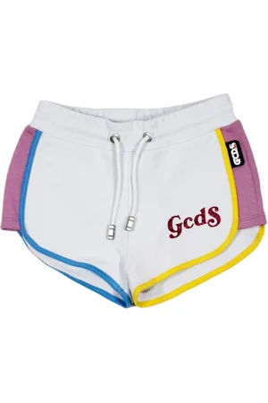 GCDS Shorts bianchi con logo glitter