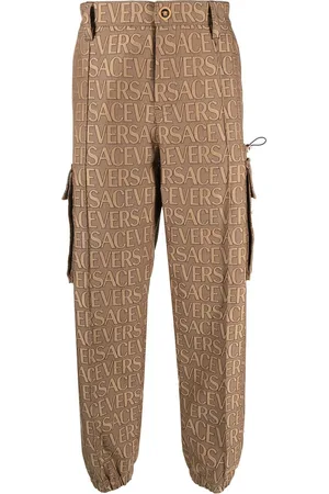 VERSACE Pantaloni cargo con logo allover