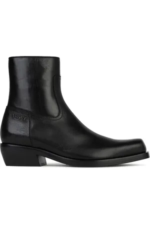 VERSACE Stivaletti in pelle nera