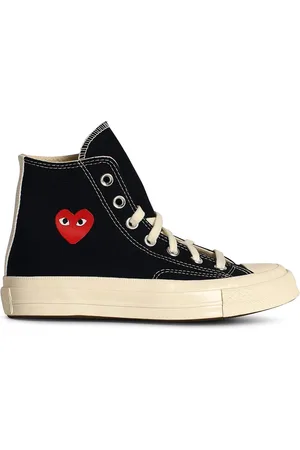 Comme des Garçons Sneakers in tela nera con cuore rosso