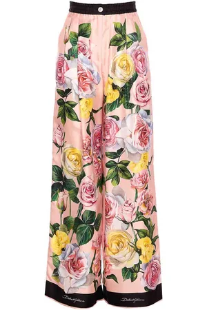 Dolce & Gabbana Pantaloni per la stampa peonia e rosa