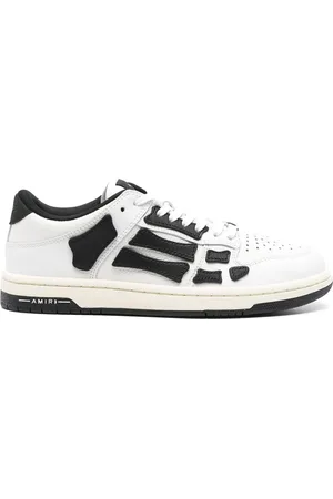 AMIRI Sneaker in pelle bianca con dettagli neri