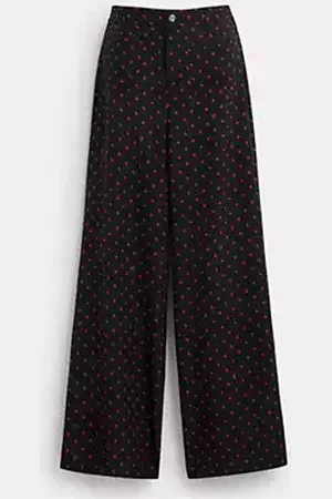 Coach Pantaloni con stampa a pois a forma di mela