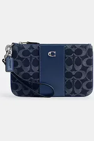Coach Bustina da polso piccola Essential in denim Signature