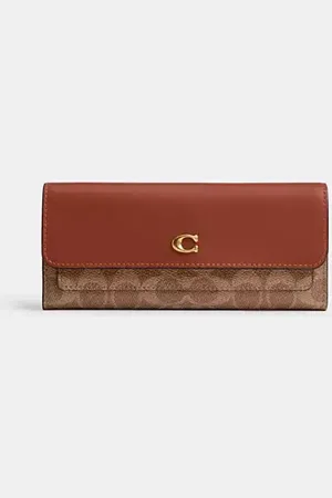 Coach Portafoglio con patta lungo Mila in tela Signature