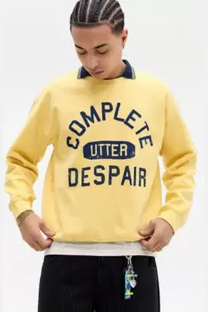 Urban Outfitters UO Yellow Utter Despair Sweatshirt di in