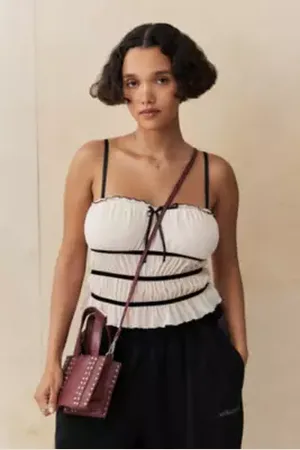 Urban Outfitters UO Studded Leather Crossbody Bag di