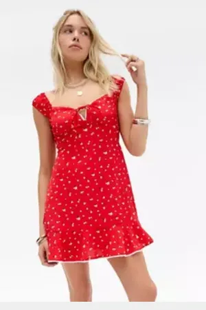 Kiss The Sky UO Exclusive Piper Mini Dress in a Urban Outfitters