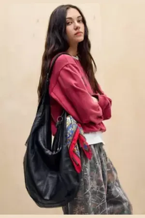 Urban Outfitters UO Casie Large Faux Leather Sling Bag di in