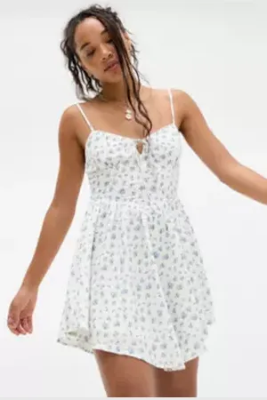 Kiss The Sky UO Exclusive Daisy Mini Dress in a Urban Outfitters