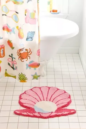 Urban Outfitters Clam Shell Bath Mat di in Pink