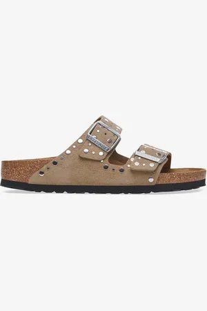 Birkenstock Arizona in suede taupe con rivetti