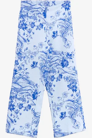 Nike Pantaloni sportivi con jacquard foliage