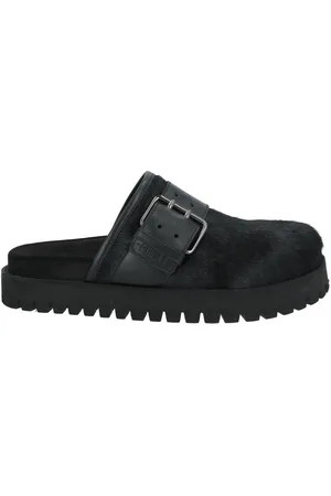High CALZATURE Mules & Zoccoli