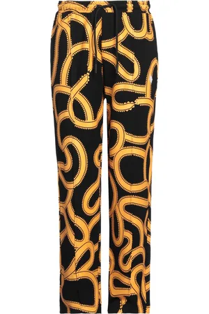 MARCELO BURLON BOTTOMWEAR Pantaloni