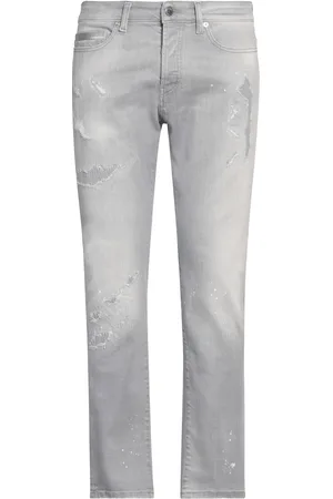 MARCELO BURLON BOTTOMWEAR Pantaloni jeans