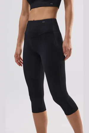 YSABEL MORA Leggings sportivi capri neri con pancia piatta