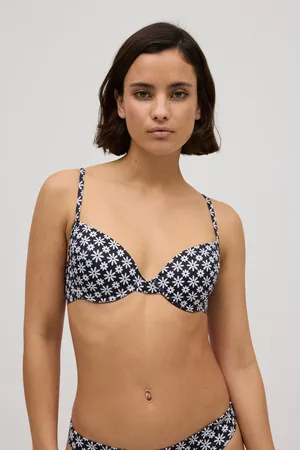 YSABEL MORA Top bikini classico a cerchio floreale bianco e nero