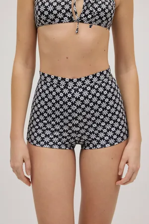 YSABEL MORA Pantaloncini da bagno a fiori bianchi e neri